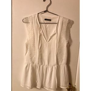 White blouse, reserved brand